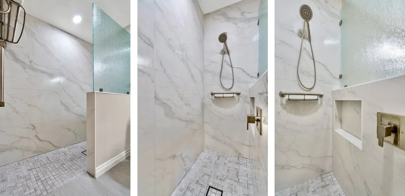 Curbless walk-in shower with a handheld shower head, grab bar and built-in niche