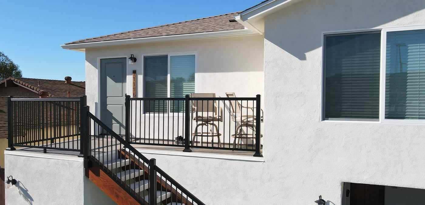 Entry deck and railing at the top of the attached ADU staircase in Mira Mesa