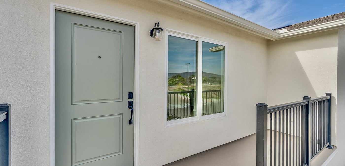Front door and window of the attached ADU in Mira Mesa, off the entry deck