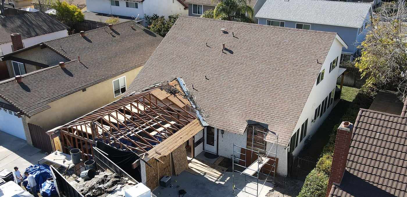 Aerial view of the garage roof removed for the second-story attached ADU in Mira Mesa