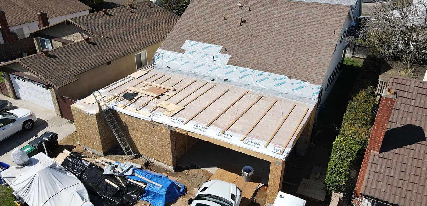 Aerial view of the new floor deck over the garage for the attached ADU in Mira Mesa