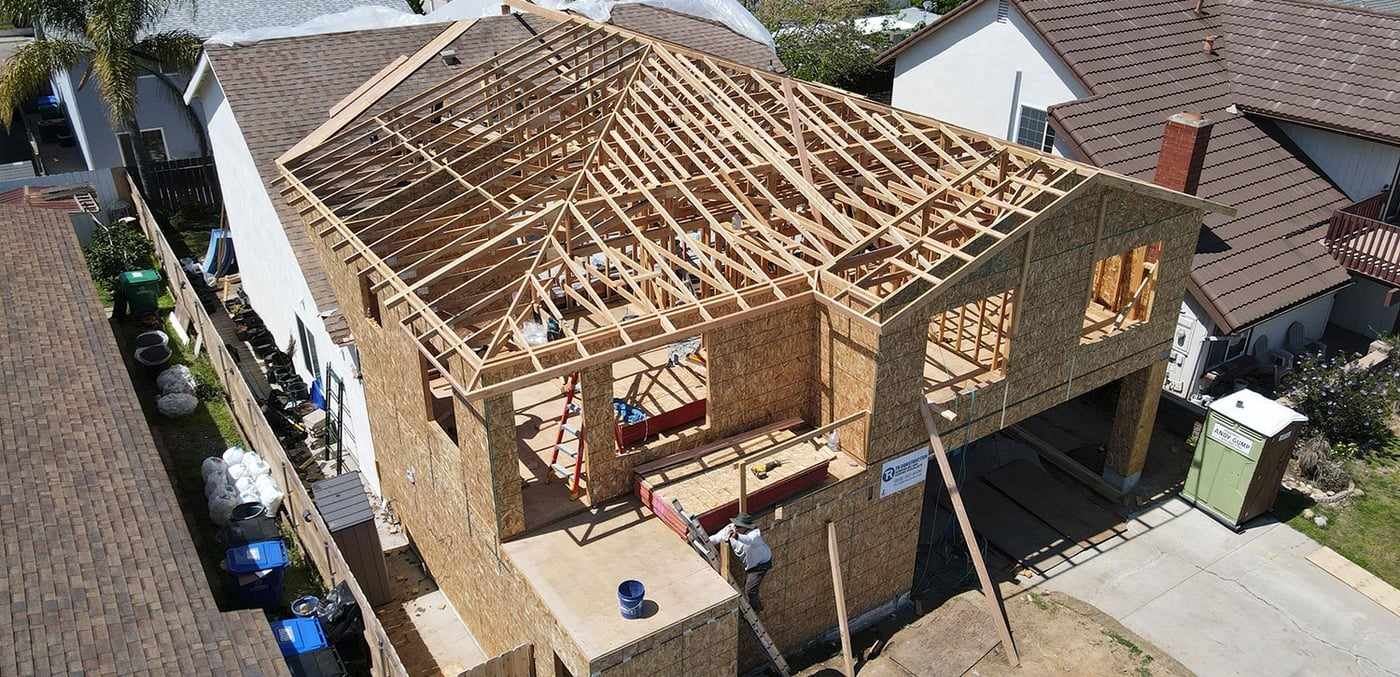 Aerial view of the attached ADU framing and sheathing above a Mira Mesa garage