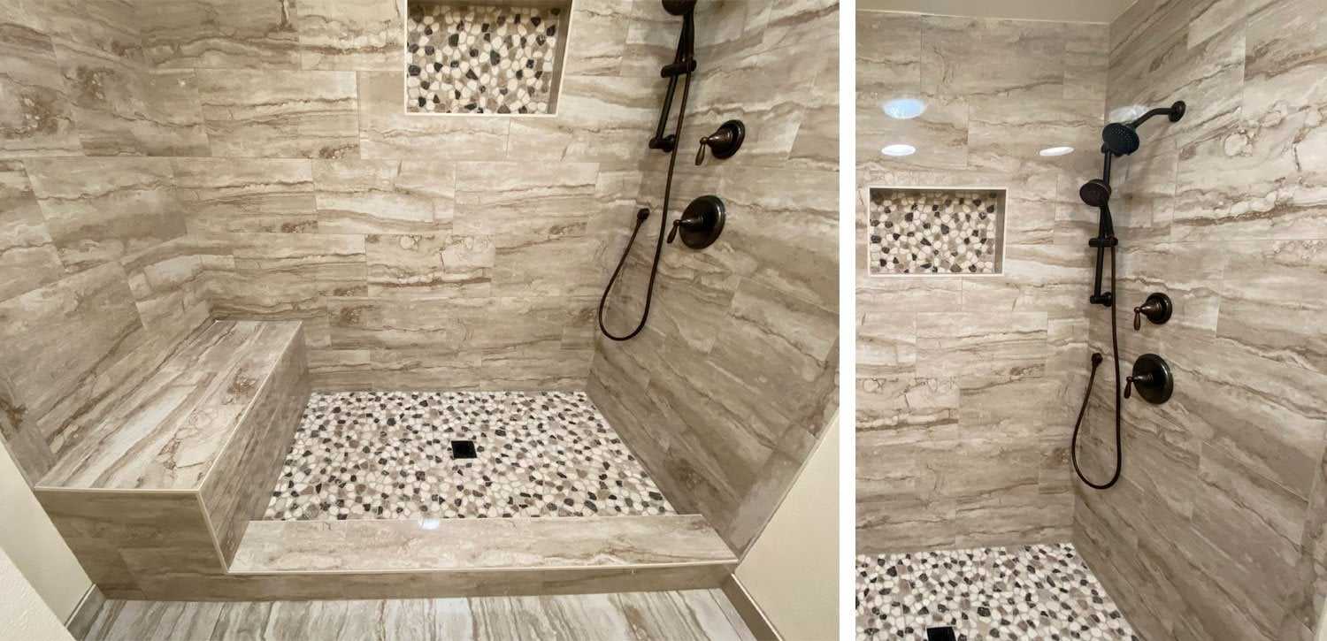 Bathtub converted to a tiled walk-in shower with a bench, a pebble floor and a built-in niche