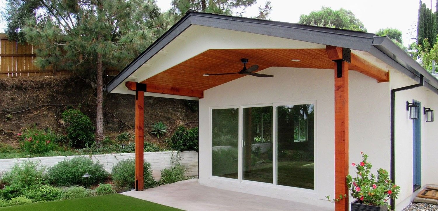 San Diego ADU with a covered wood-beam patio and sliding glass doors