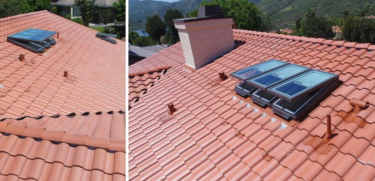 New skylights installed in a red clay tile roof