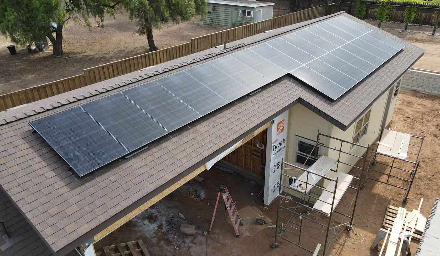 Solar panels on the roof of a San Diego home addition under construction