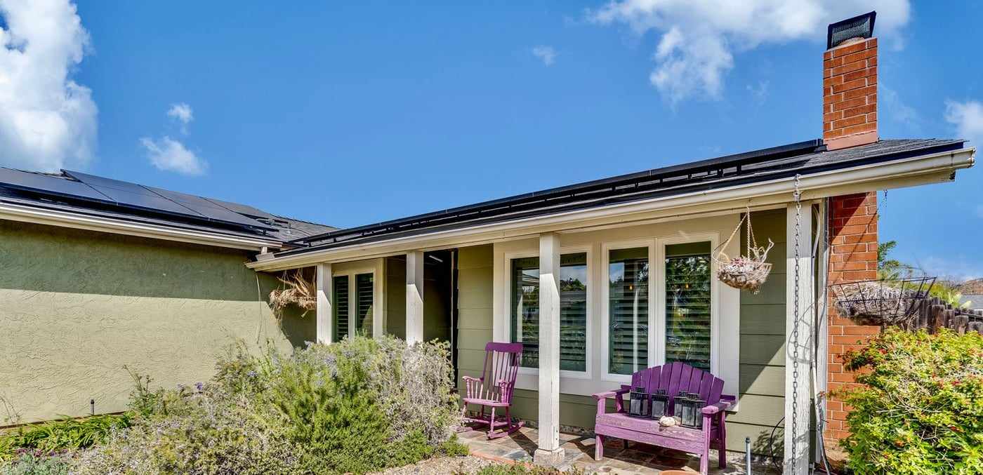 Solar panels on a single-story Poway home, seen from the front yard